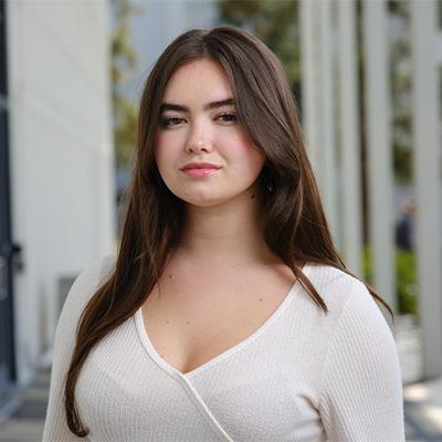 a woman posing for a headshot